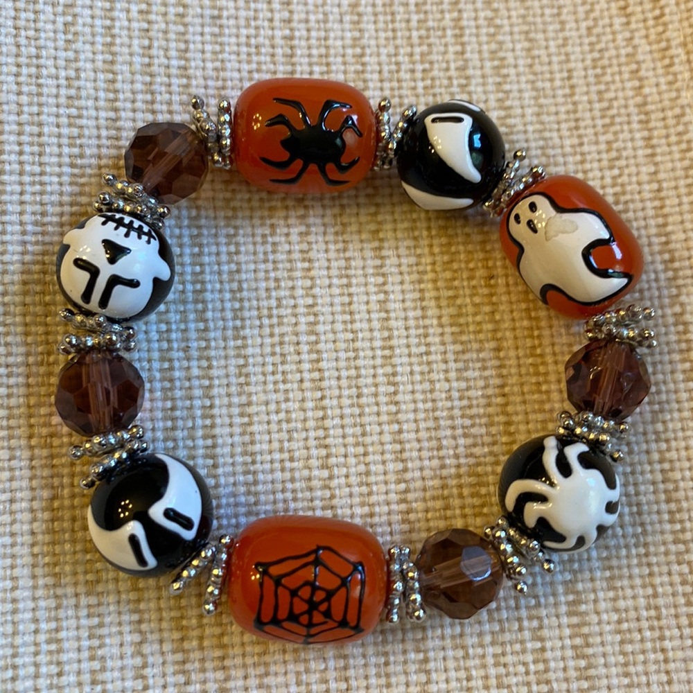 Halloween Themed Stretch Bracelet. Ghost, Spider, Fangs, Skull and Web.